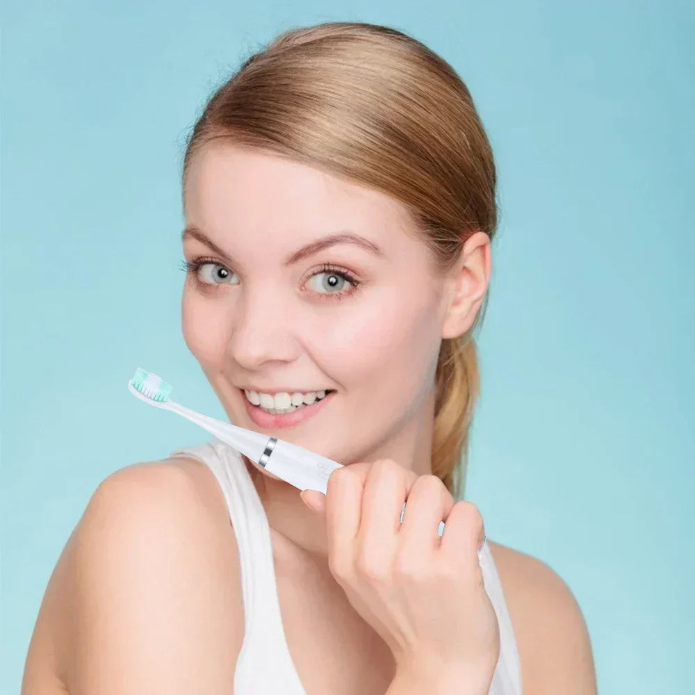 Electric sonic toothbrush with multiple brushing modes and replacement brush heads for daily oral care | Sansoti