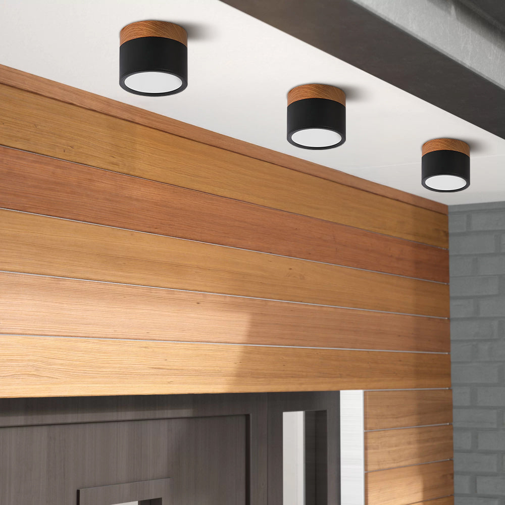 Plafonnier rond moderne en aluminium avec accents en bois et LED, éclairage scandinave pour entrée, salle à manger et salon | Sansoti