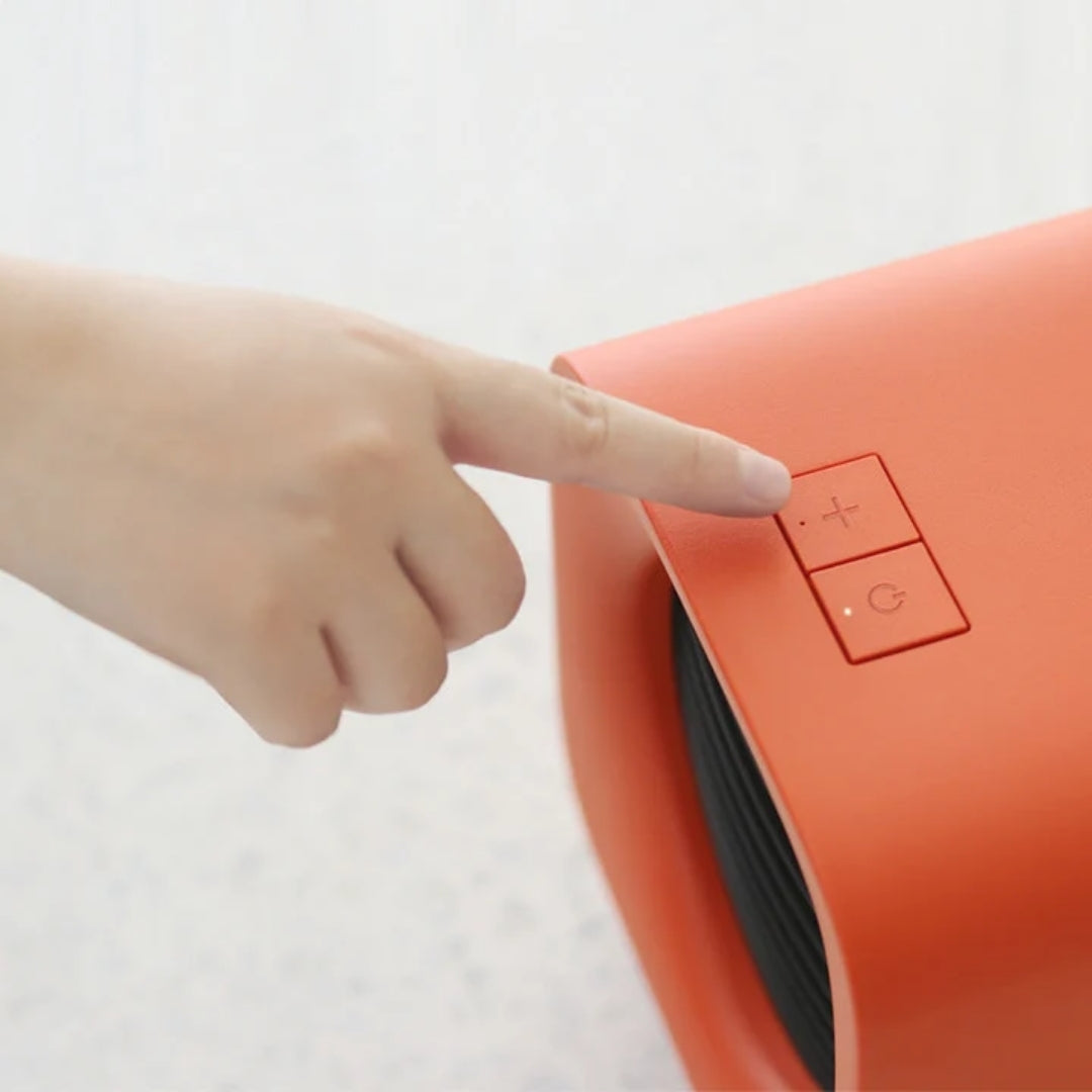 Compact Electric Heater 700W Portable Heating Appliance Orange White Yellow For Office And Home Use | Sansoti