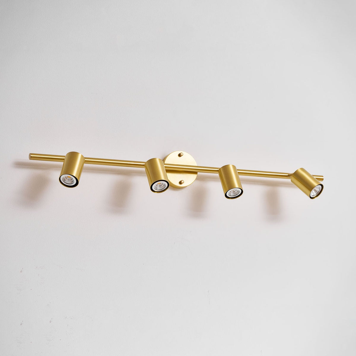 Adjustable wall lamp with brass or black finish – 2 to 4 light points | Sansoti