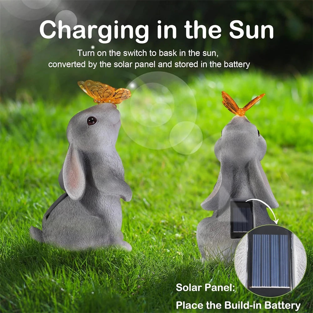 Figura de conejo con energía solar para jardín, resina, 22,5cm, LED con mariposa, lámpara solar para jardín, terraza y césped, decoración exterior y regalo de Pascua | Sansoti