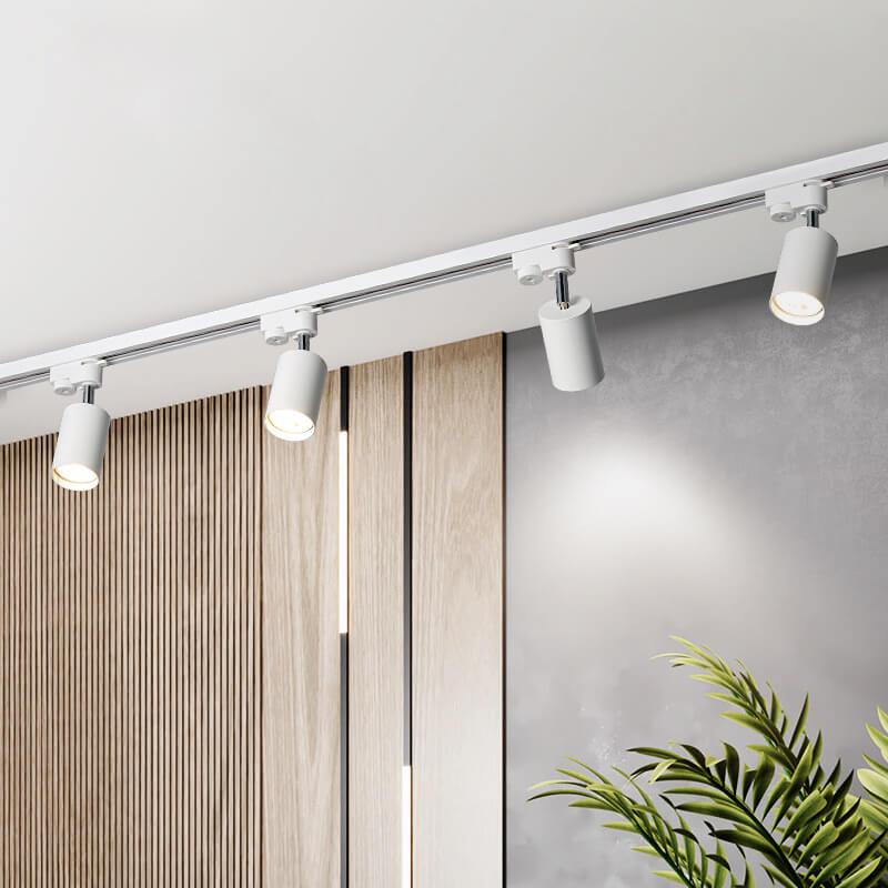 Adjustable ceiling track system with 3-5 spotlights, black, white and gold, dimmable, warm light, modern living room interior | Sansoti
