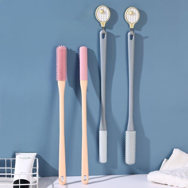 Toe brush for foot hygiene, soft bristles, ergonomic handle, compact bathroom wellness accessory | Sansoti