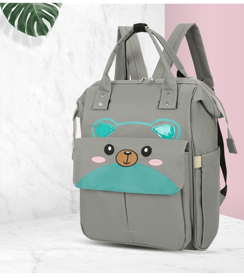 Spacious Multifunctional Thermal-Insulated Diaper Bag Backpack with Compartments, Stroller Attachment, and Convenient Baby Care on the Go | Sansoti