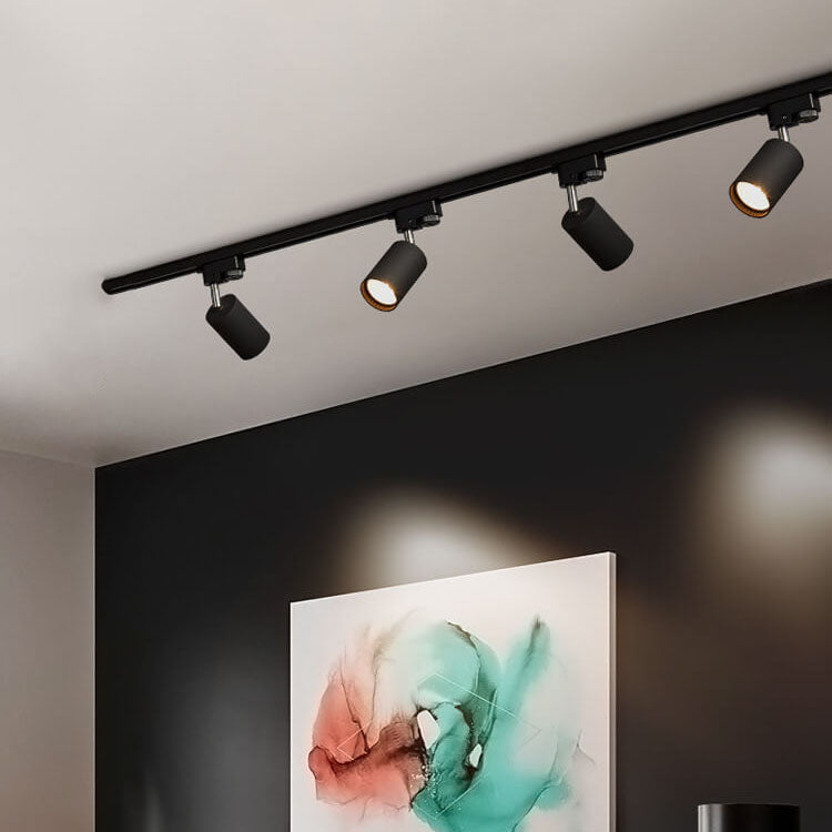 Adjustable ceiling track system with 3-5 spotlights, black, white and gold, dimmable, warm light, modern living room interior | Sansoti