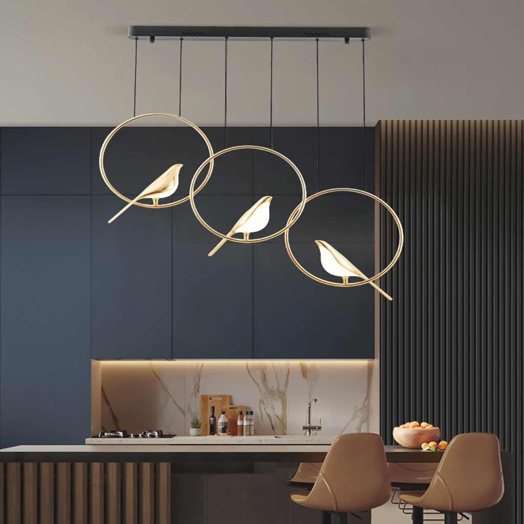 Suspension LED Pie noir et doré, lustre au motif d’oiseau moderne et décoratif pour salon et salle à manger | Sansoti