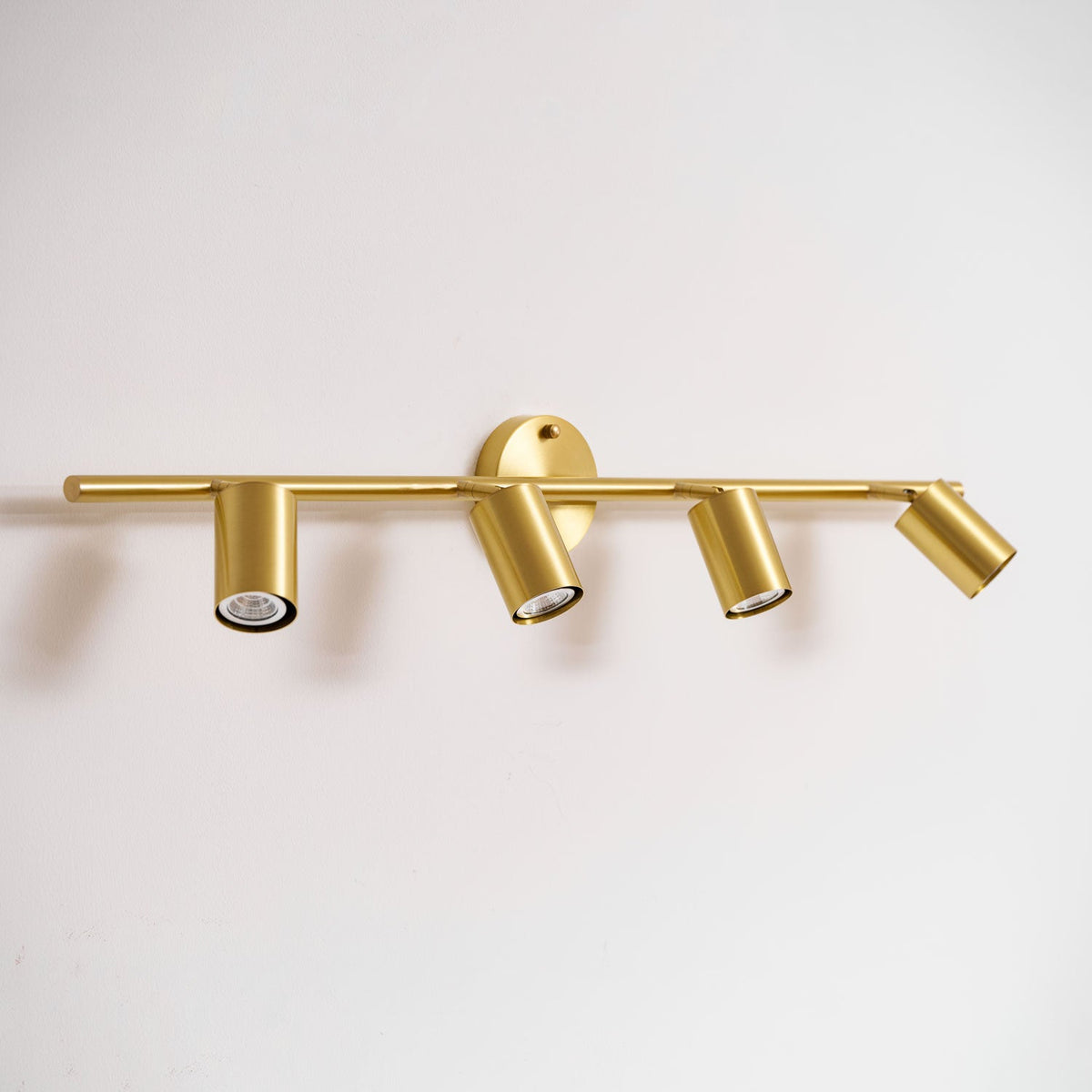 Adjustable wall lamp with brass or black finish – 2 to 4 light points | Sansoti