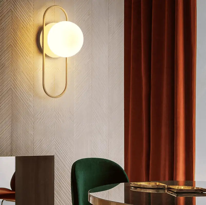 Aplique de pared de esfera de cristal industrial de aluminio negro y dorado 58cm | Sansoti