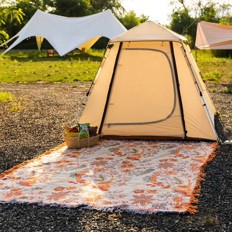 Baumwollplaid mit Boho Blumenmuster – Orange und Blau auf cremefarbenem Untergrund mit Fransen – Dekorative Tagesdecke für Sofa und Bett | Sansoti